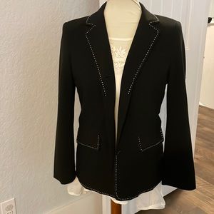 Black blazer with white stitch detail. Size 4P